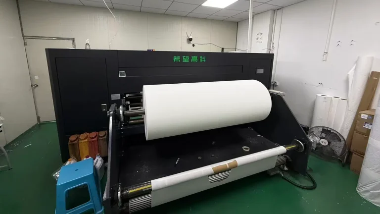 xiwanggaoke High-Tech industrial digital inkjet printer at iDeskMat factory, outputting high-fidelity graphics for custom desk mats.